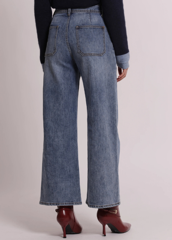JEANS DE GANGA COM APÕELICAÇS LATERAIS ASSIMÉTRICAS - MIMI MUA
