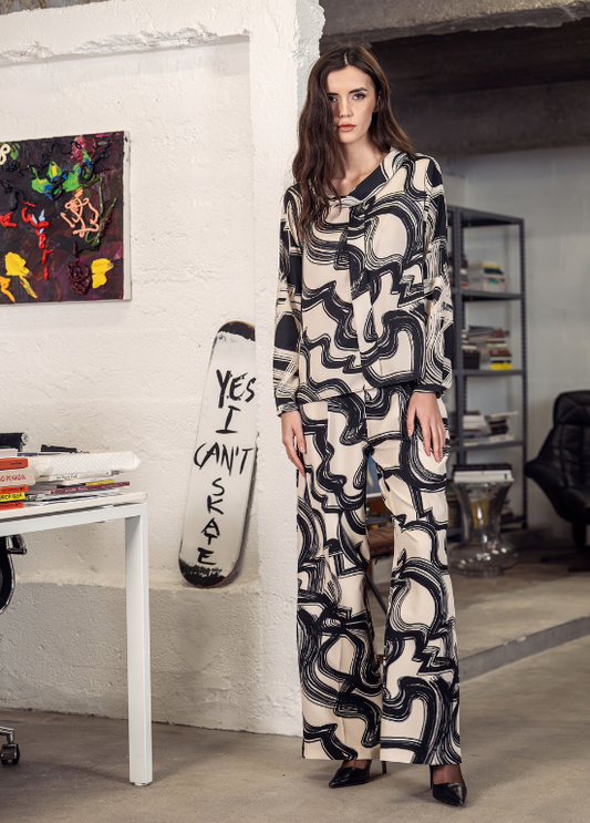 CALÇAS DE MALHA COM ESTAMPADO ABSTRATO E ELÁSTICO NA CINTURA - SCUSI