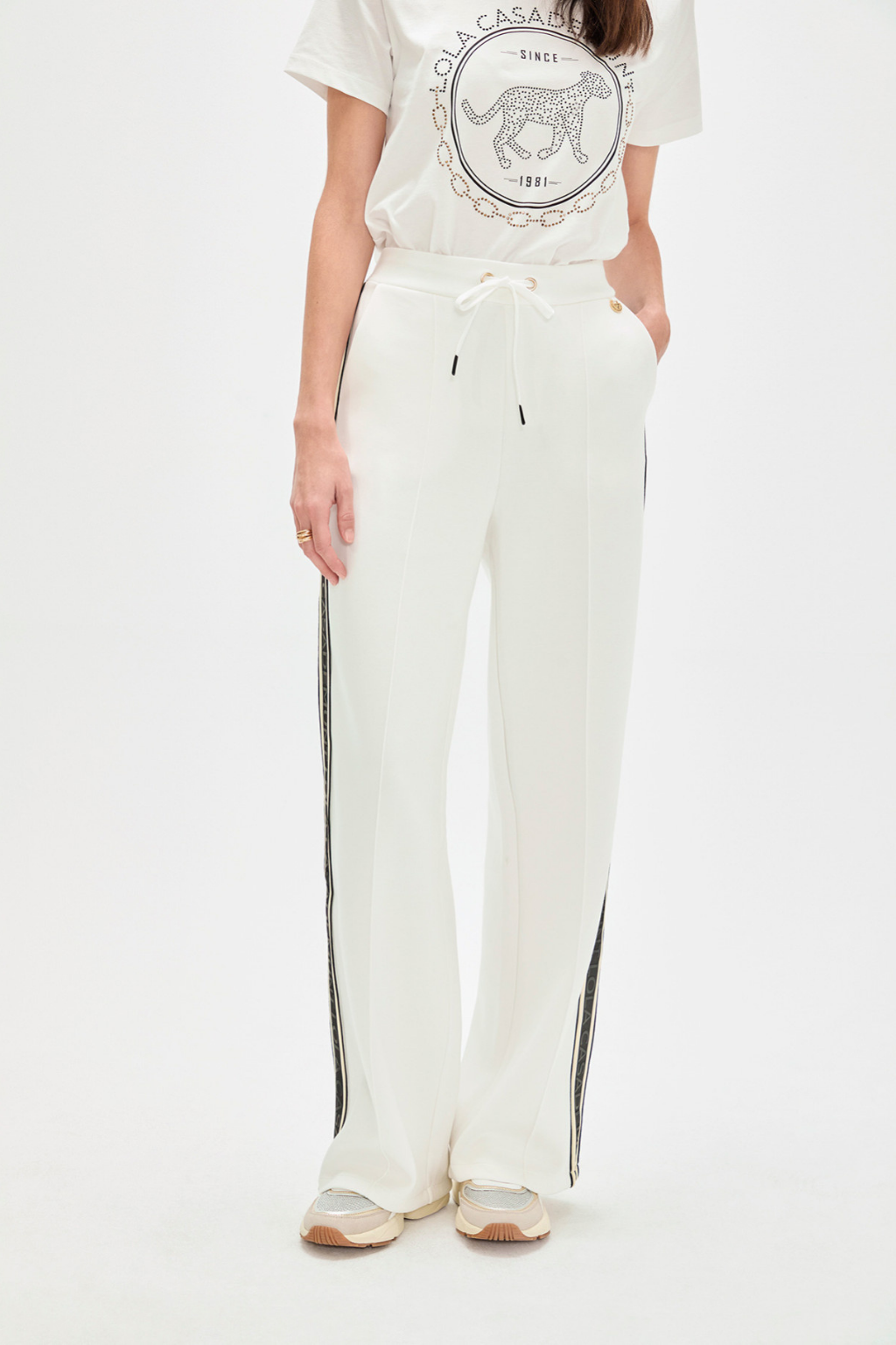 CALÇAS EM TECIDO SCUBA COJM RISCA CONTRASTANTE - LOLA CASADEMUNT