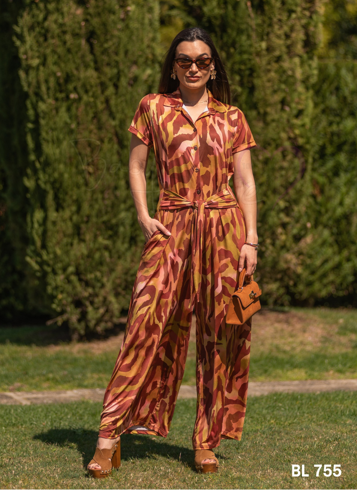 MACACÃO ESTAMPADO ANIMAL PRINT COM LAÇADA À FRENTE -  BABY LOVE