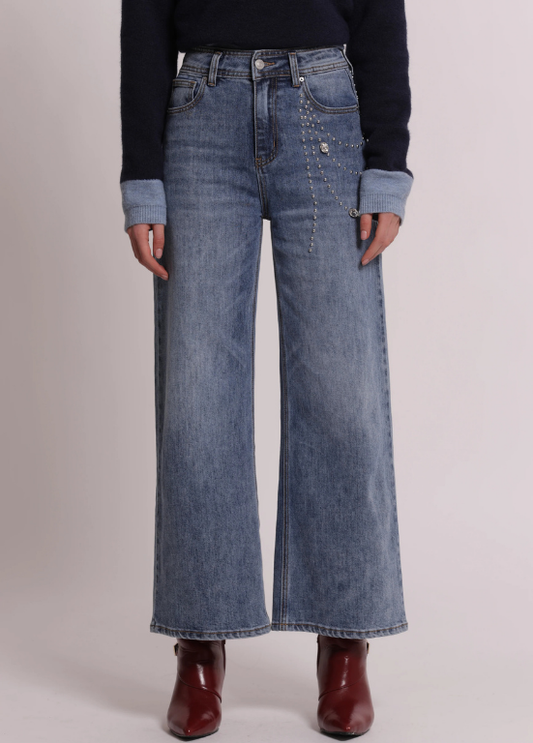 JEANS DE GANGA COM APÕELICAÇS LATERAIS ASSIMÉTRICAS - MIMI MUA