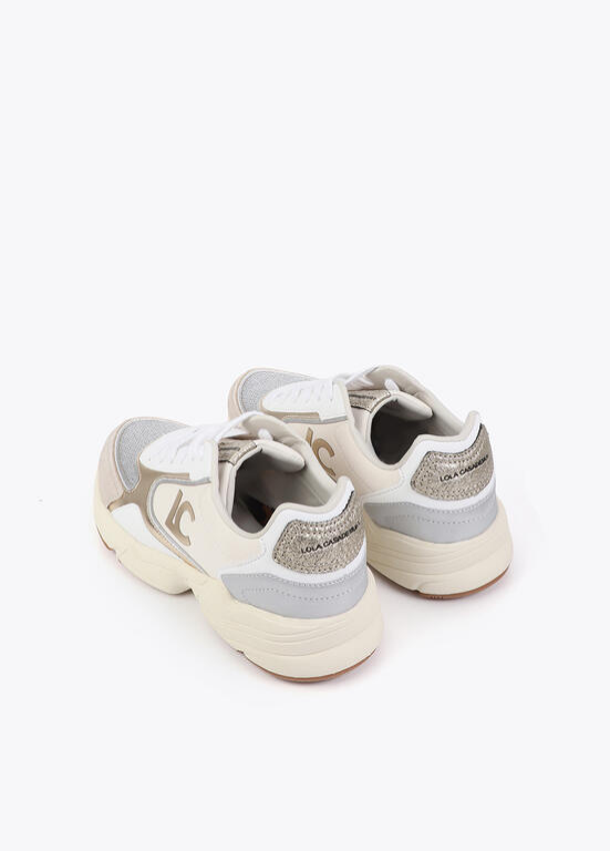 TÉNIS COM SOLA TIPO RUNNING BRANCO E DOURADO - LOLA CASADEMUNT