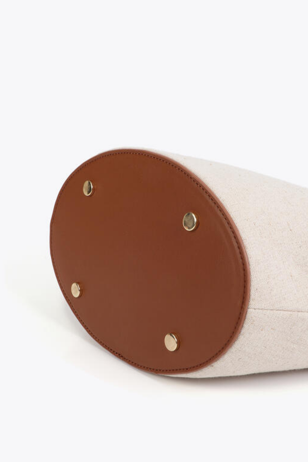 MALA BUCKET BICOLOR COM ALÇA ENTRAÇADA - LOLA CASADEMUNT