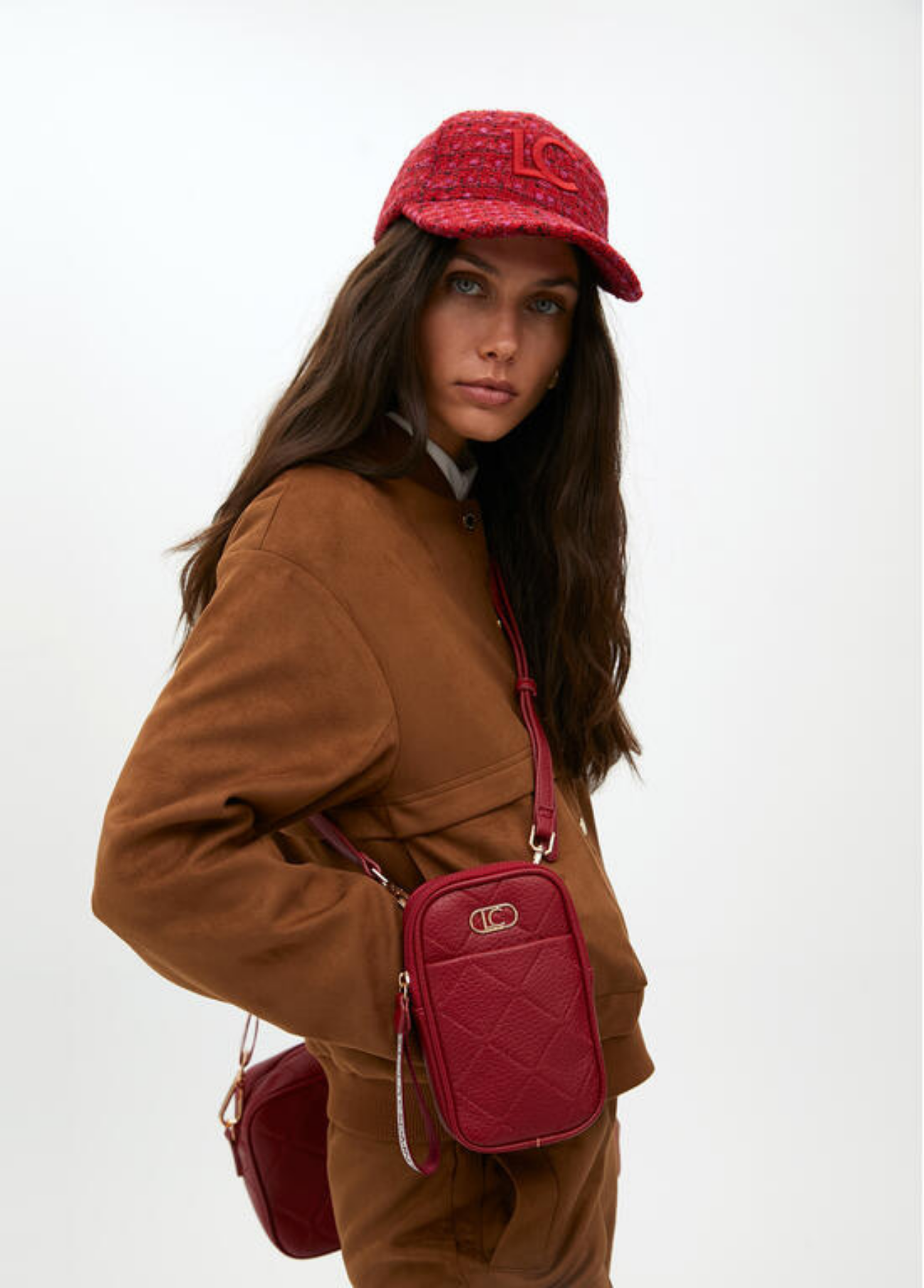 BOLSA DE TELEMÓVEL ACOLCHOADA TIRACOLO E COM ALÇA DE PULSO - LOLA CASADEMUNT