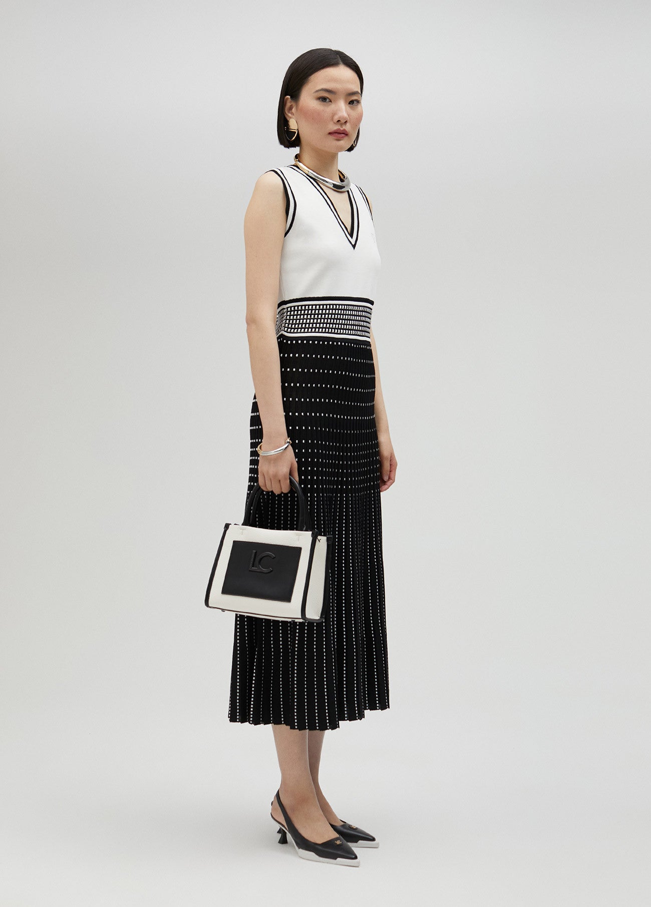 VESTIDO DE MALHA EFEITO PLISSADO - LOLA CASADEMUNT
